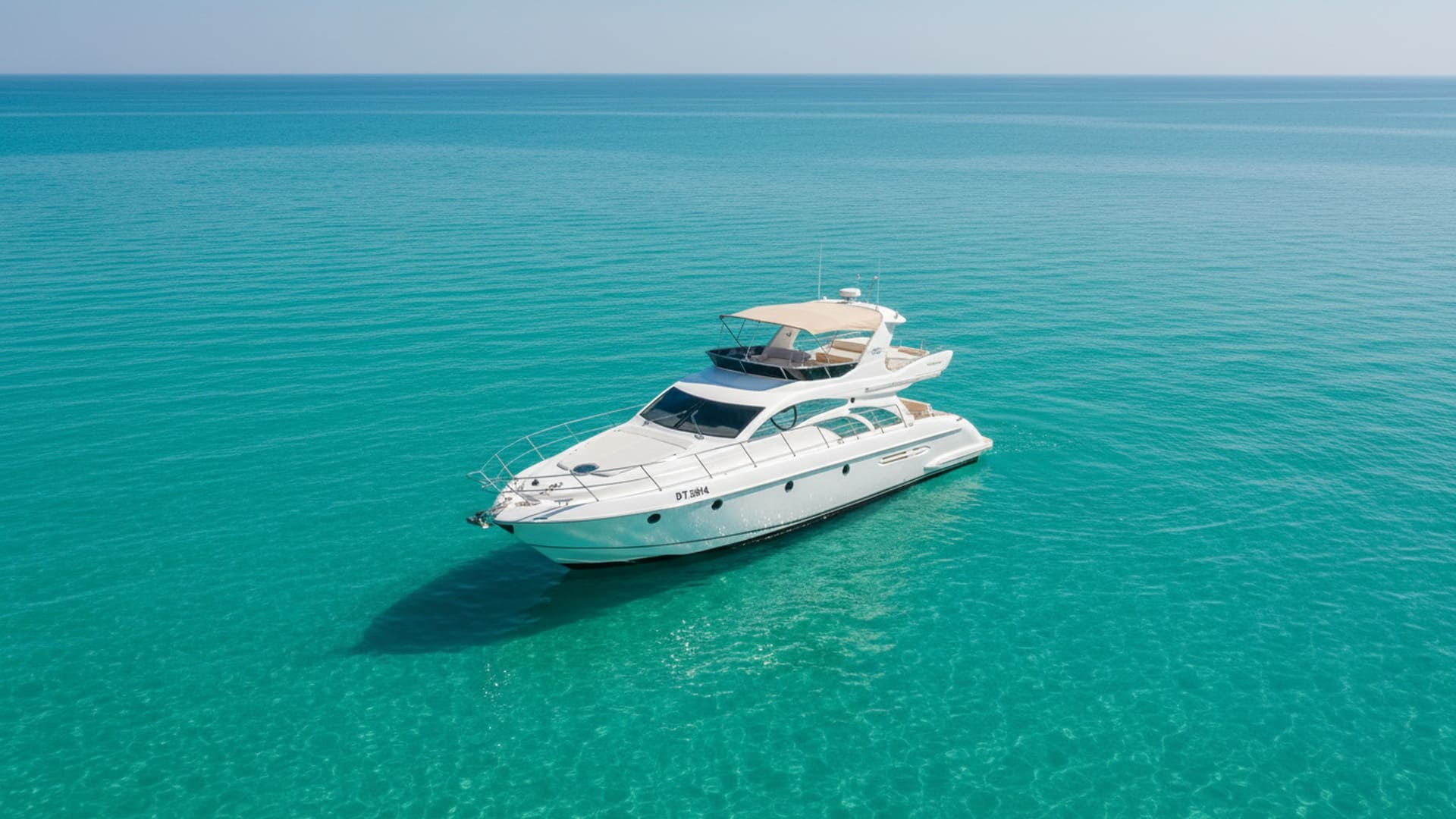 Aerial view of Sapphire Jewel 50 ft cruising Dubai Marina