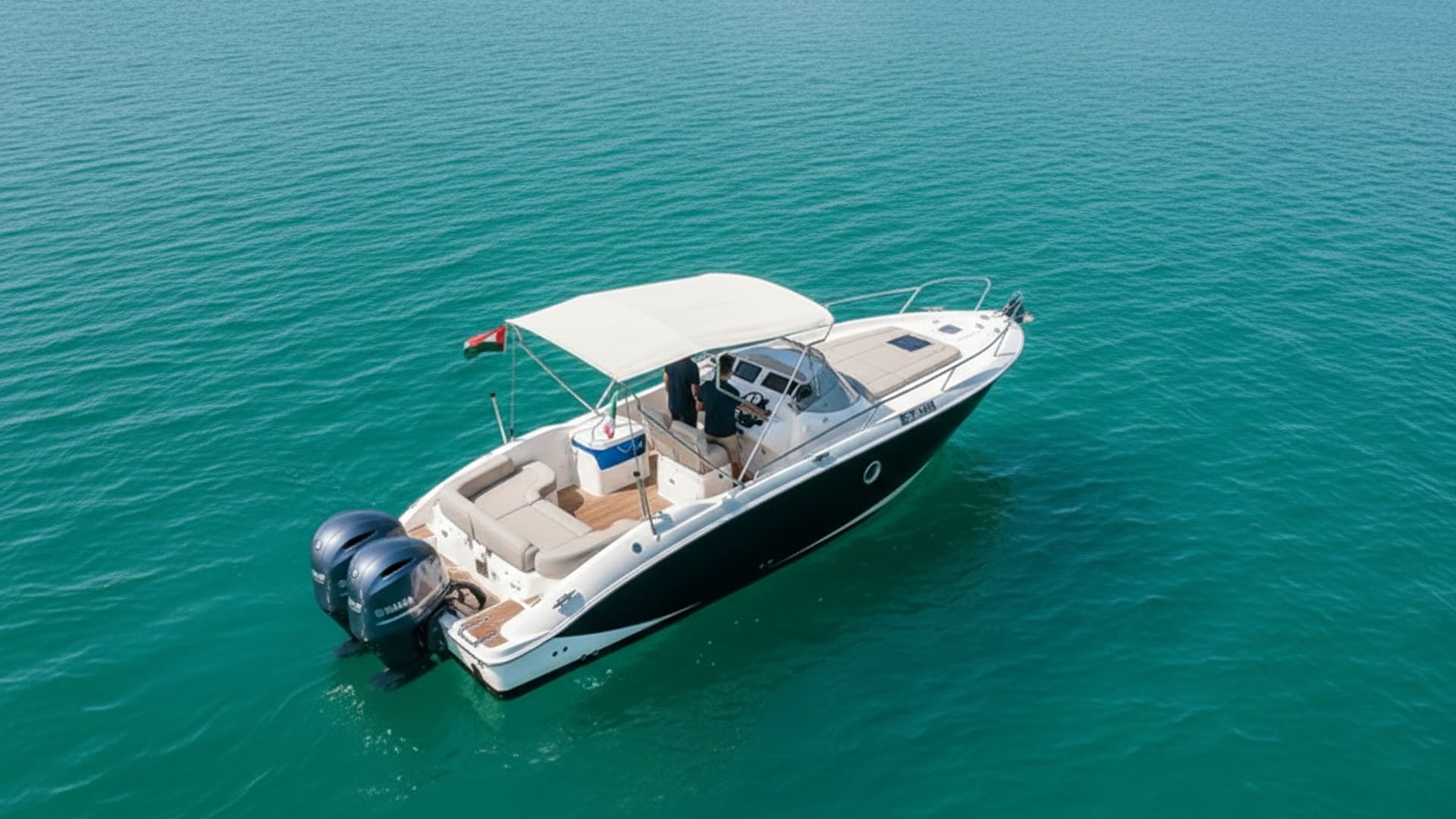 Aerial perspective of Paradise Crown 27 ft cruising Dubai Marina